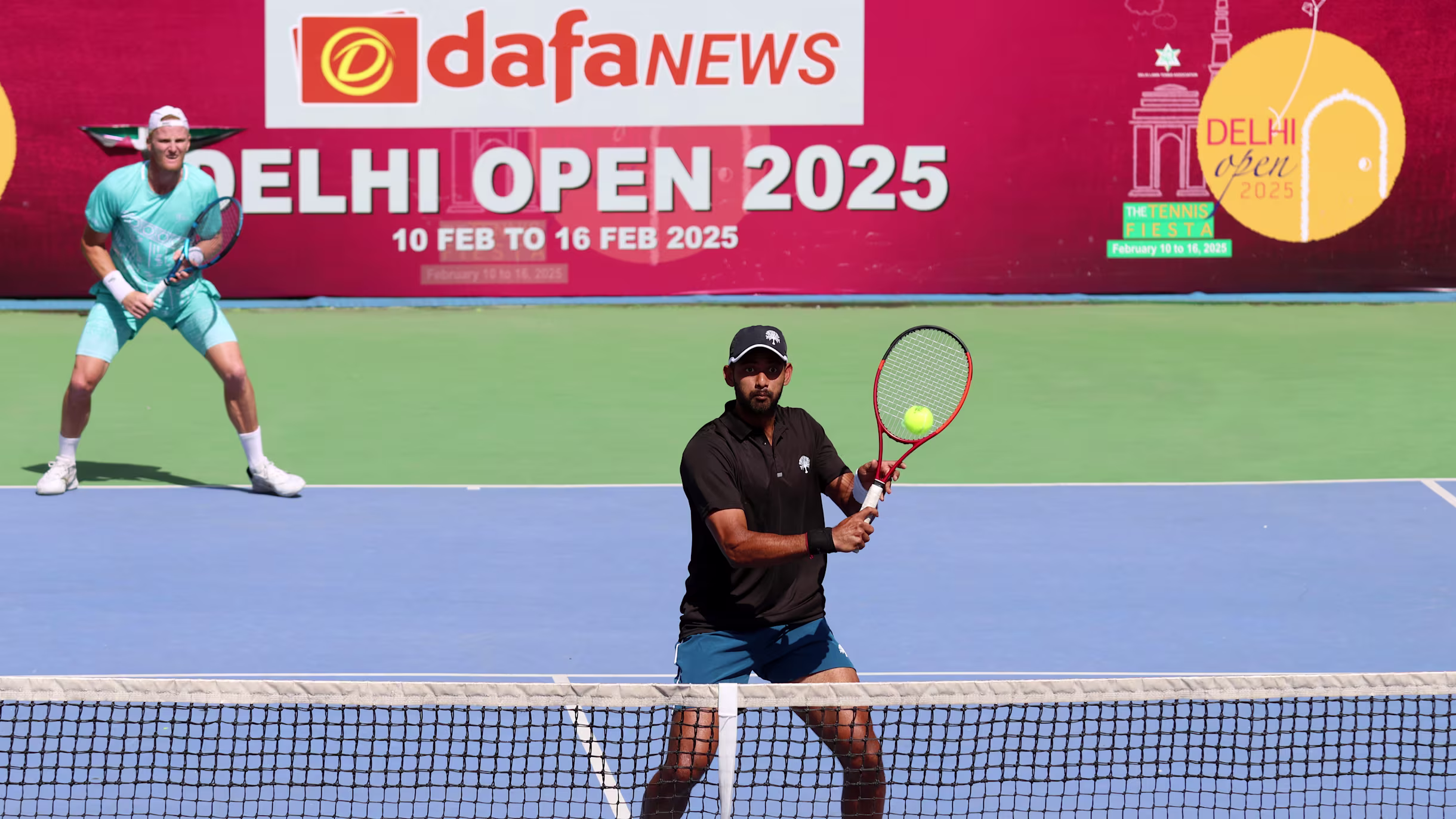 Niki Kaliyanda Poonacha and his partner Pruchya Isaro of Thailand