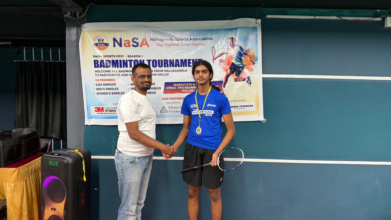 Aakash won the singles title at the NaSA badminton tournament