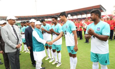 Telangana governor Shiv Pratap Shukla meeting the police football teams