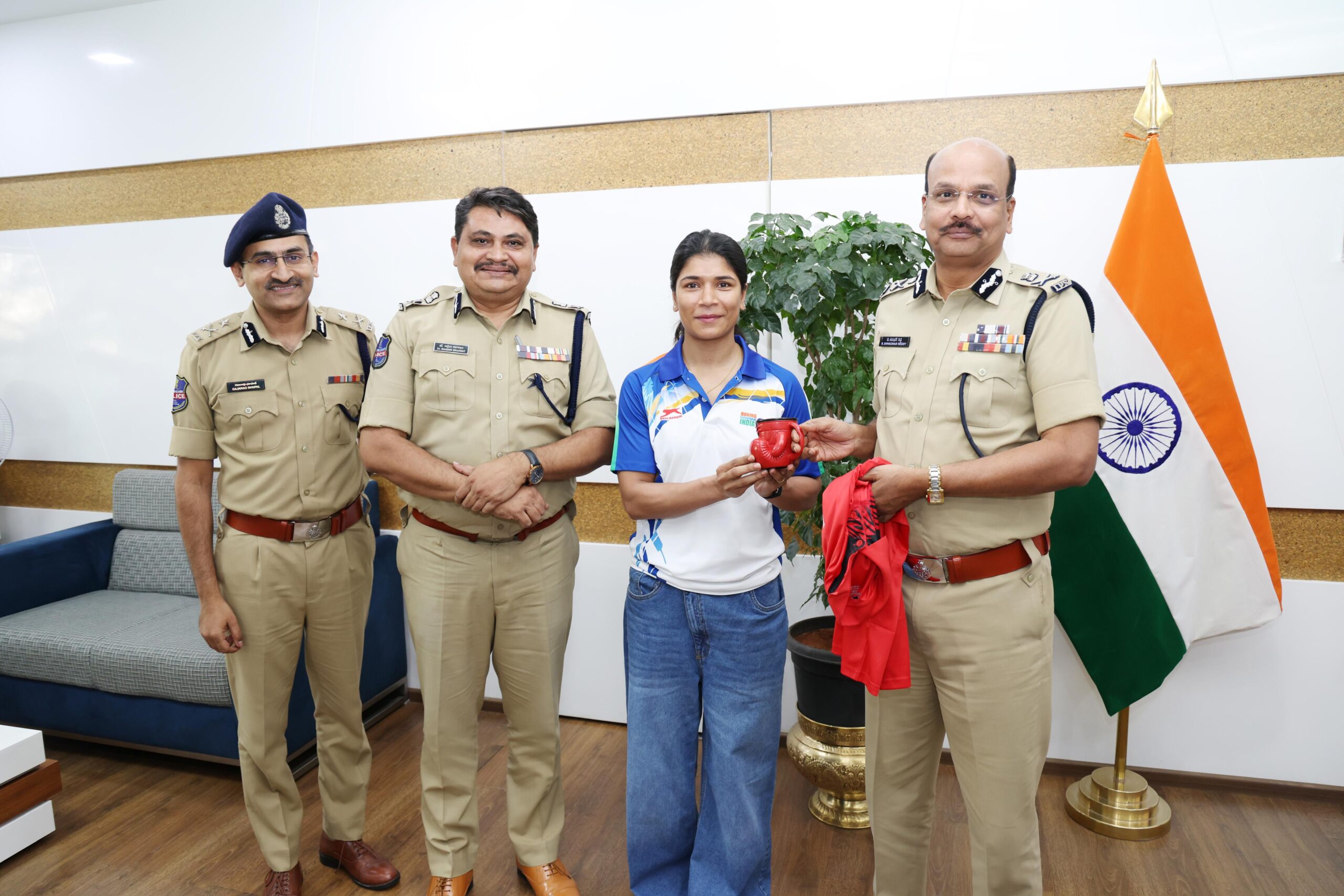 Nikhat Zareen with Telangana DGP B Shivadhar Reddy