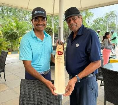 CV Anand and Kapil Dev
