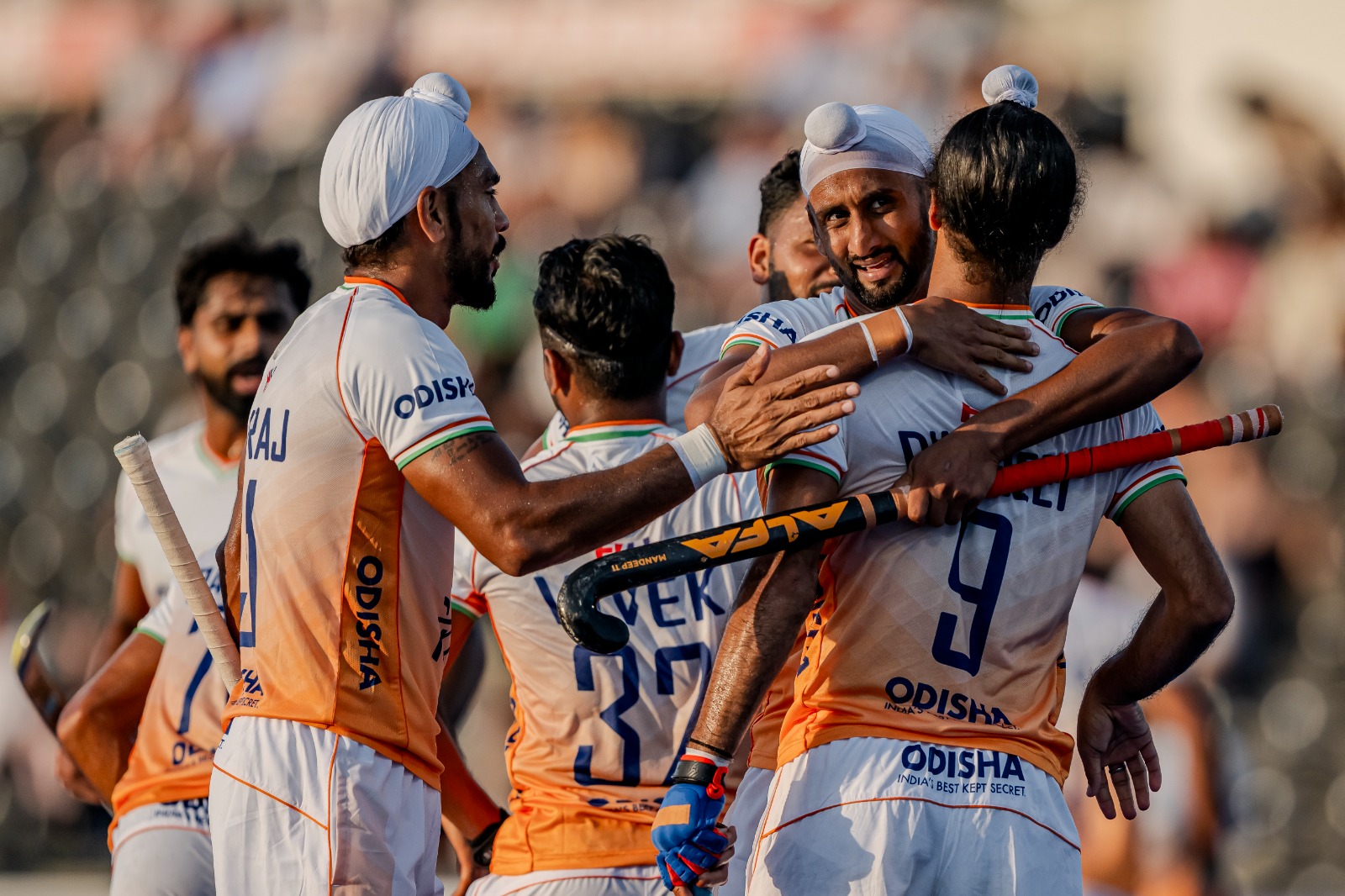 Indian players celebrate a goal