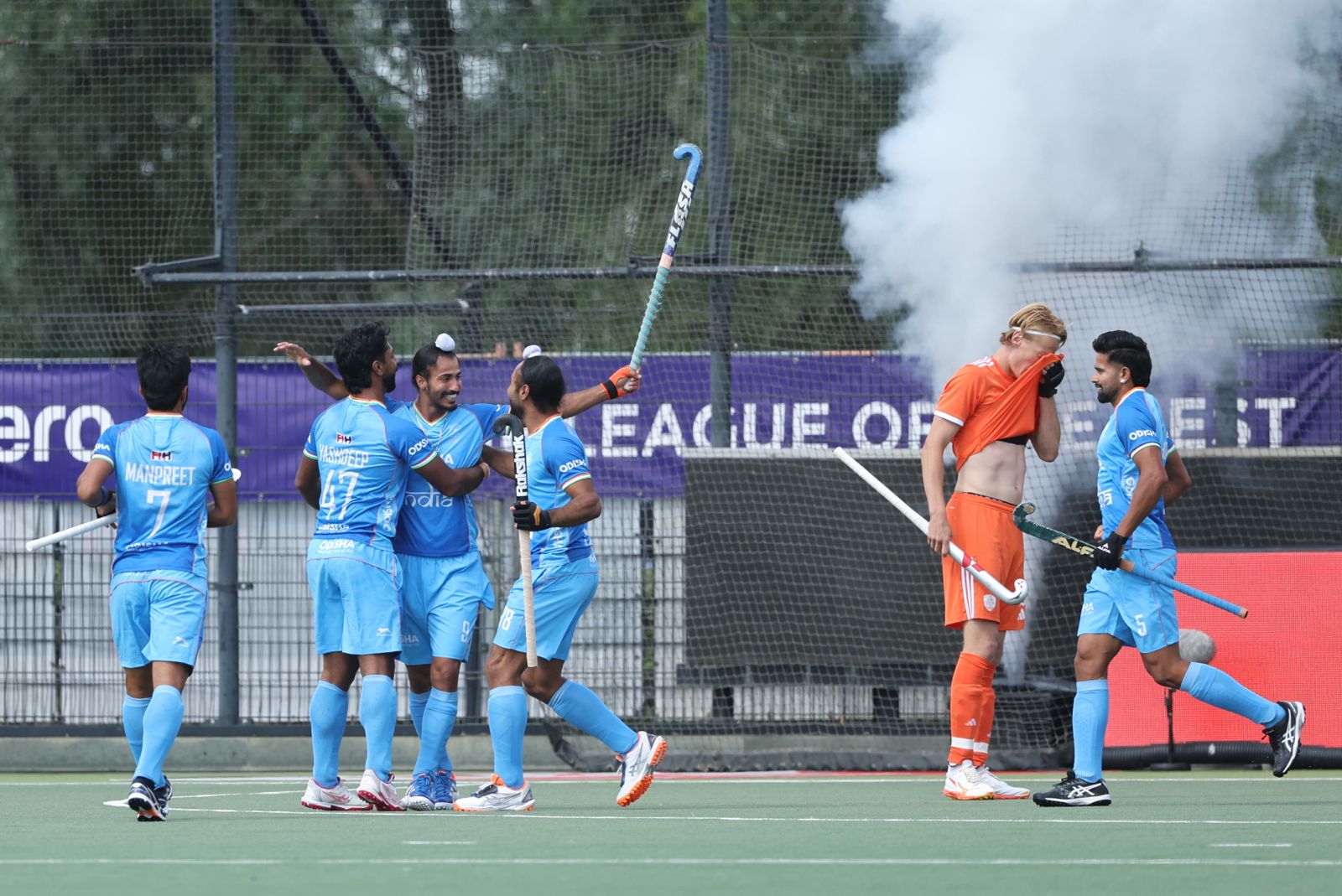 India celebrate a goal against the Netherlands