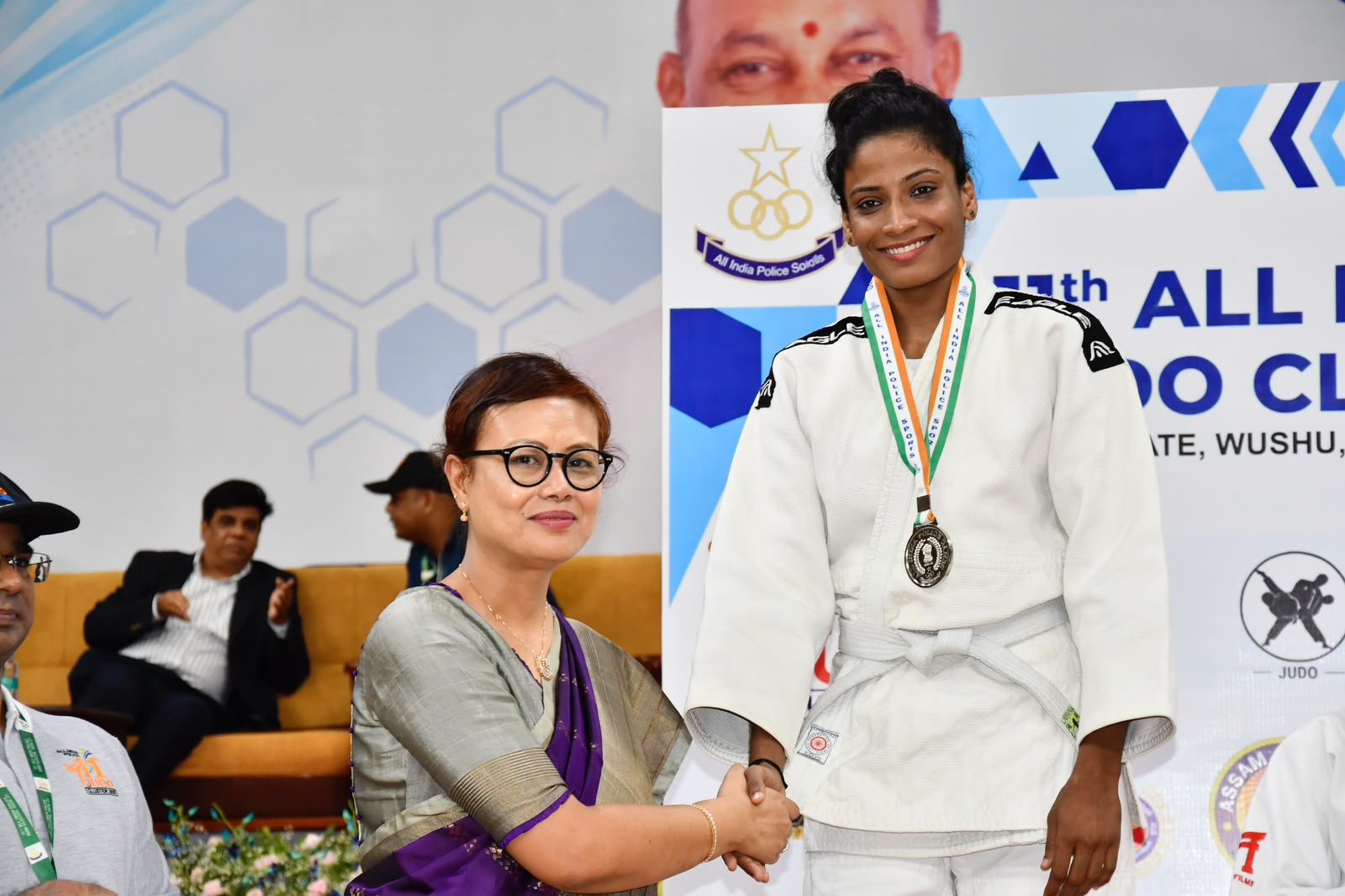 Dr A Sonibala Devi giviing the medals to a SSB winner