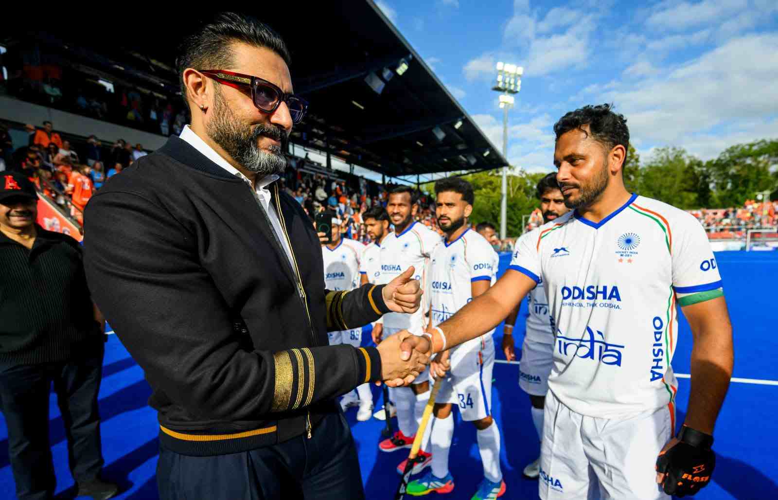 Abhishek Bachchan with the Indian hockey team