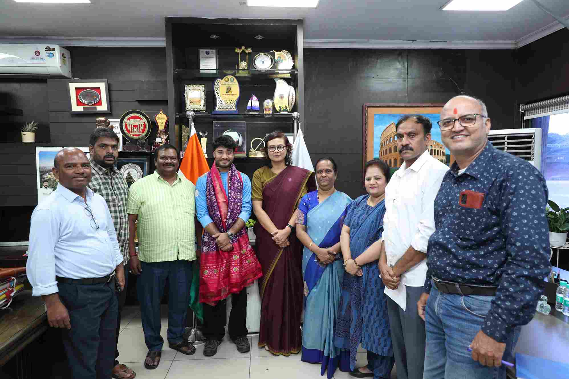 Dhanush Srikanth being felicitated by SATG MD Sonibala Devi