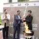 Chess Olympiad ceremonial Torch handed to Uzbek GM Javokhir Sindarov by Anand and Narang