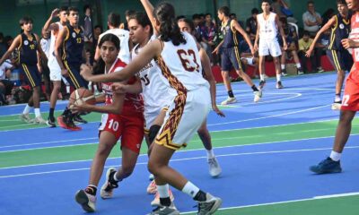 Telangana's Saanvi Kolisetty drives past a defender to score a basket against Karnataka in the 41st Youth National Basketball in Pune