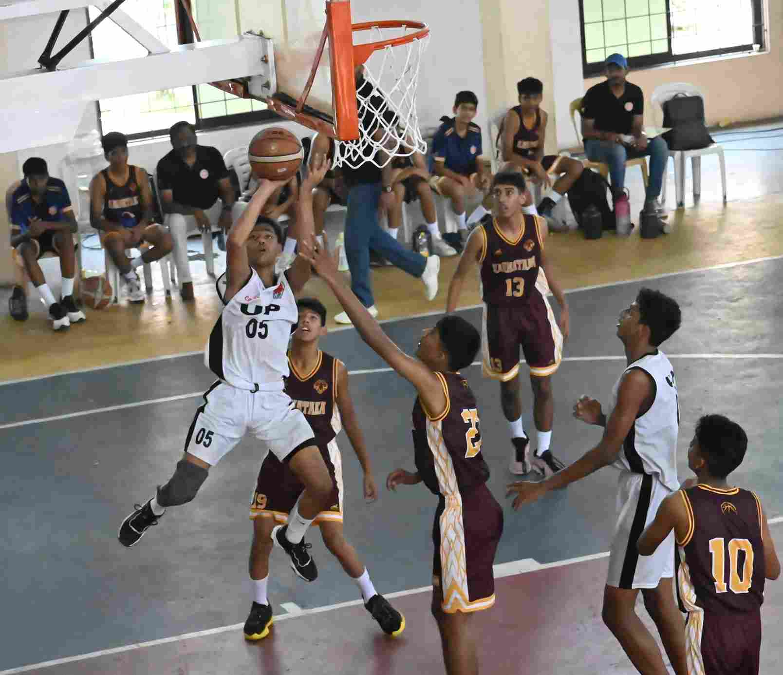 Sameer Singh of Uttar Pradesh scores against Karnataka