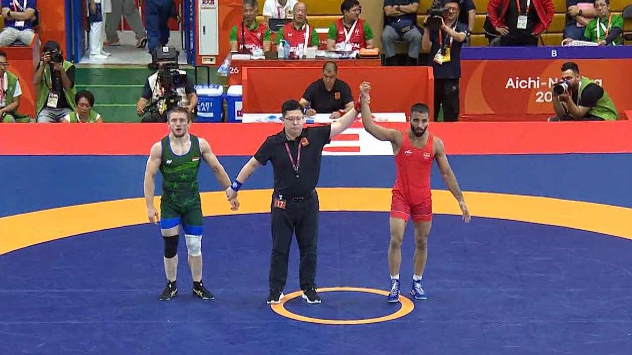 Sujeet Kalkal makes a sensational comeback to down Kudiev and grapple the 65kg gold